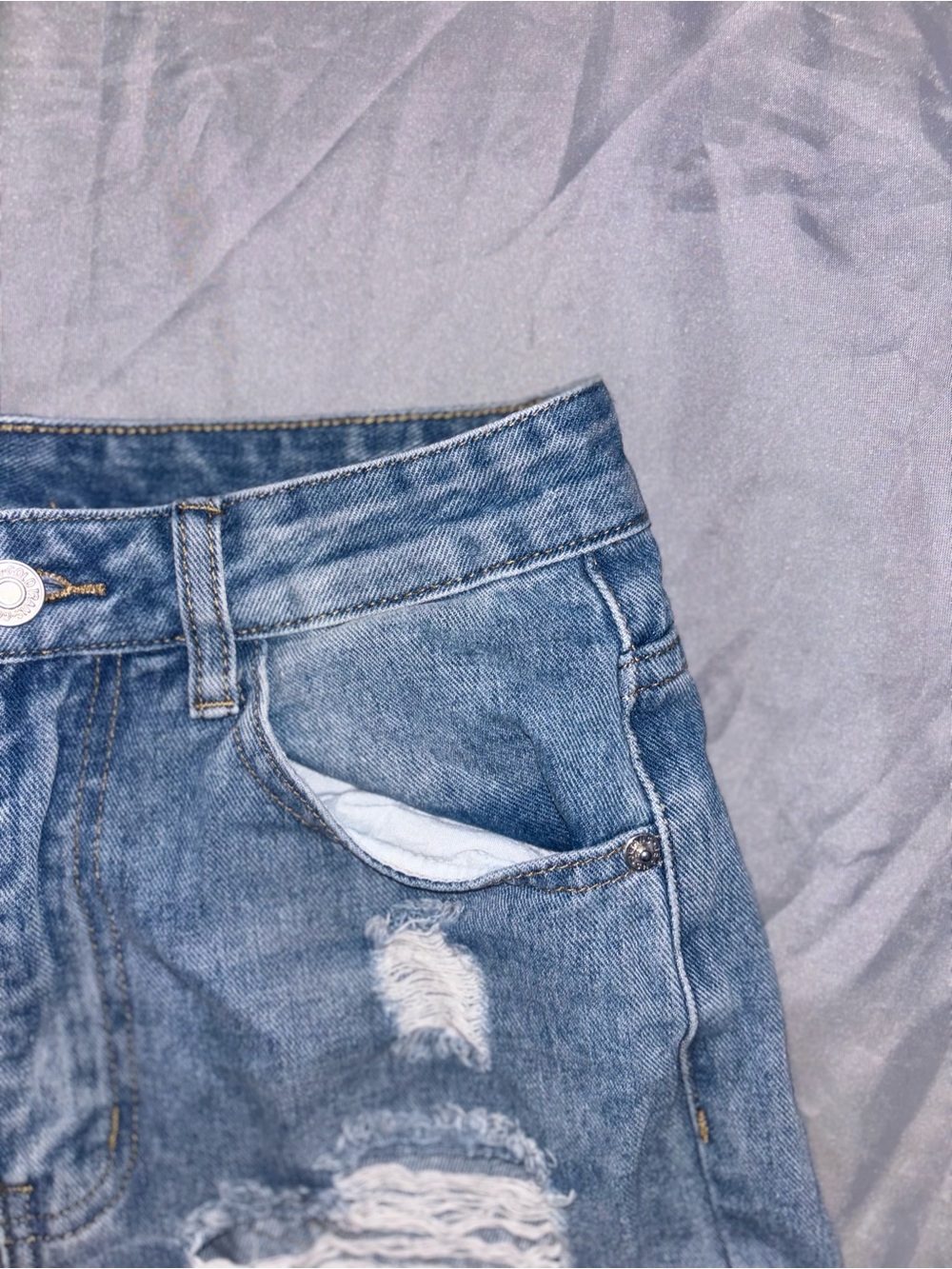 High-Rise Distressed Light Blue Denim Shorts